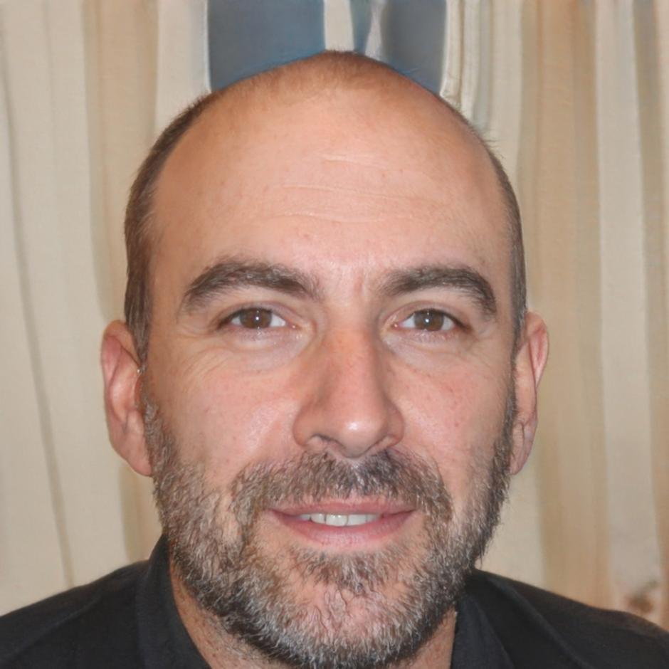 Professional headshot of mature male investment advisor in business attire